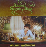 Ahmet-Selcuk-Ilkan-Mum-Isiginda