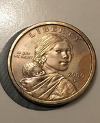 Limpieza y repatinado de un dólar Sacagawea del año 2000 9076-C070-39-BF-4672-812-D-ECFCEC8789-D1