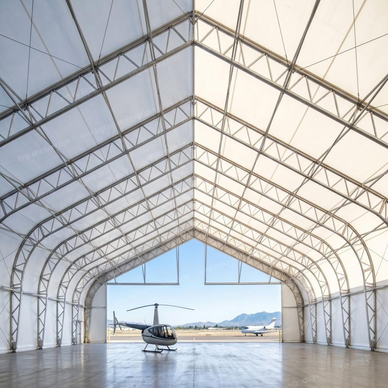 Large span aluminum aircraft hangar tent exterior showing clear span structure and modular design for versatile aviation applications