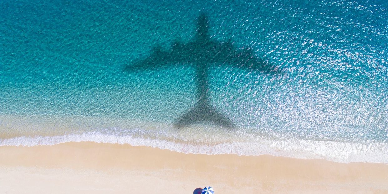 Plane shadow on beach