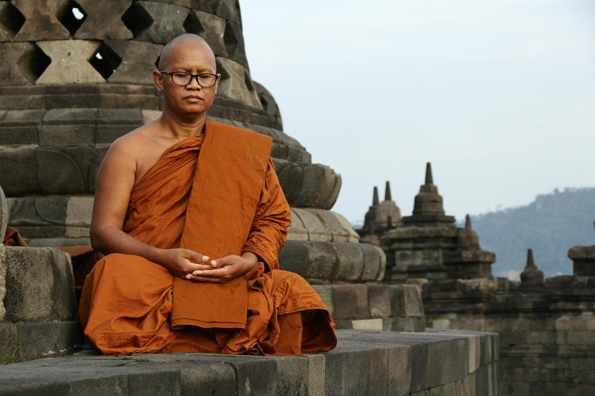 free-photo-of-buddhist-monk-sitting-and-meditating.jpg