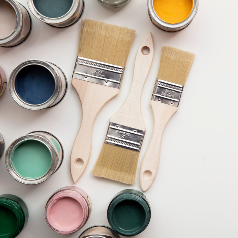 male-hand-paints-with-white-paint-wood-painting-concept-close-up-place-text Exterior painting colors