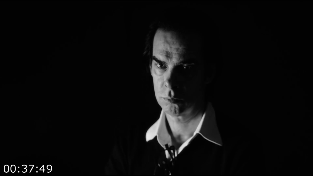 [Kép: Nick-Caves-Veiled-World-2025-1080p-WEBri...AAC5-1.png]