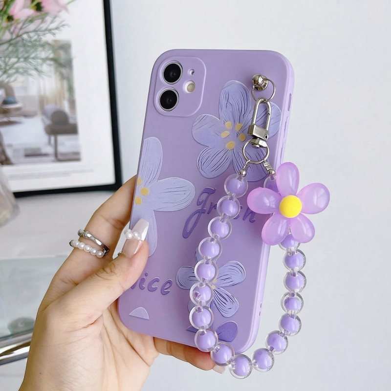 Foto de Funda violeta con diseño de flores.
