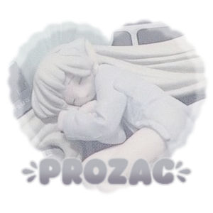 an image of a doll figure with the word "prozac" overlayed