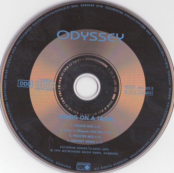 00-odyssey-riding_on_a_train_(remixes)-cd-(855_651-2)-cdm-1994-idf