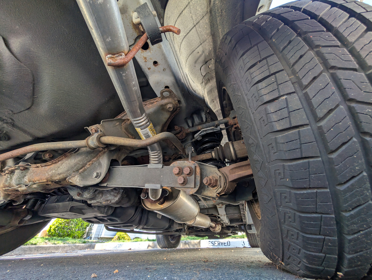 Under Passenger Rear Wheel