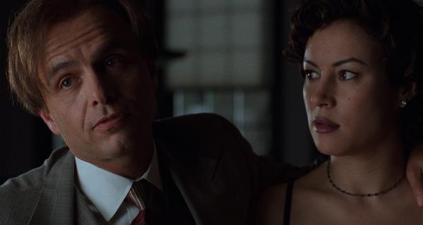 still frame from bound (1996) showing joe pantoliano as Caesar. Joe pantoliano also plays ralphie in the sopranos