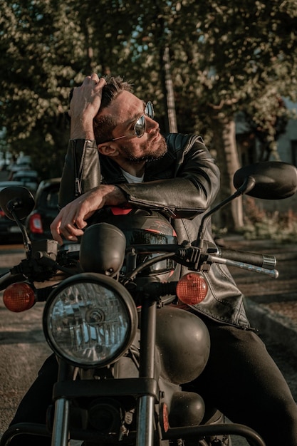 cool-spanish-male-biker-with-leather-jacket-sunglasses-181624-56955.jpg