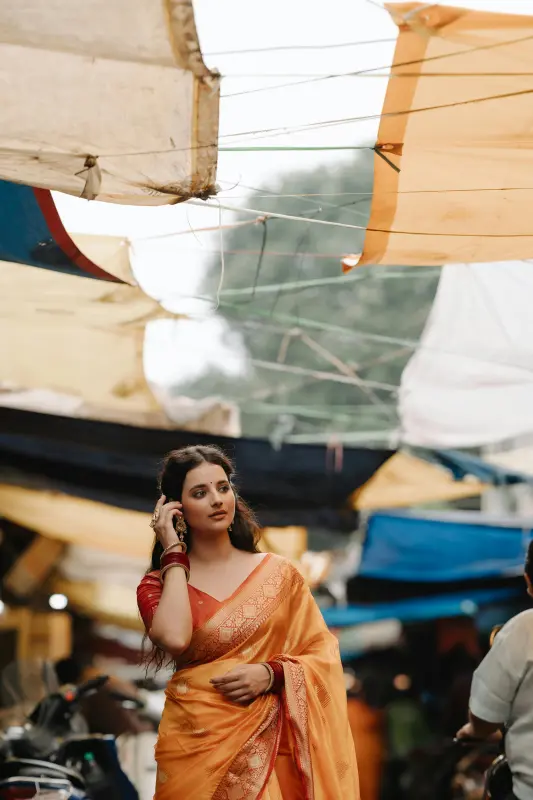 Women guest in saree walking through Ujjain street