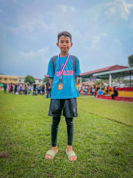Aslah bersama medal ditempat ke 3