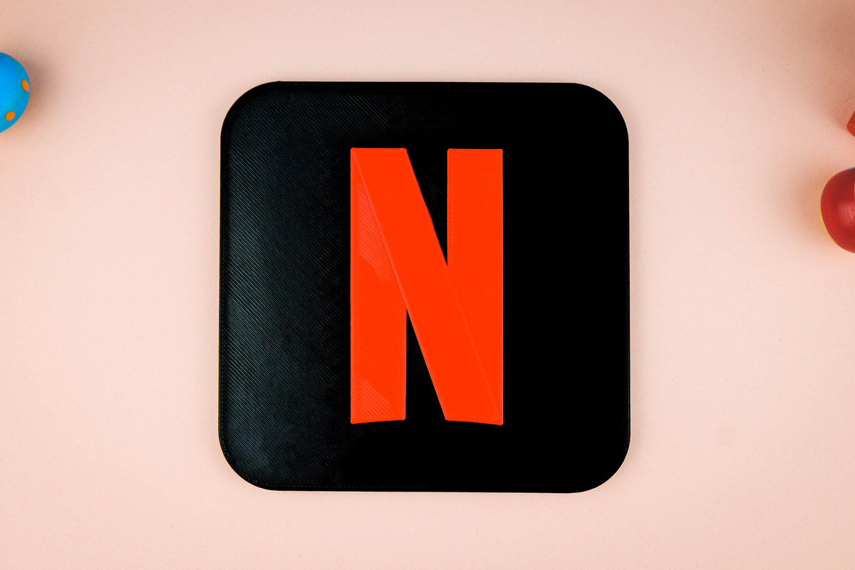 20th Century Fox Logo in yellow colors in a light blue and soft pink background. There are wooden toys for a decorative.