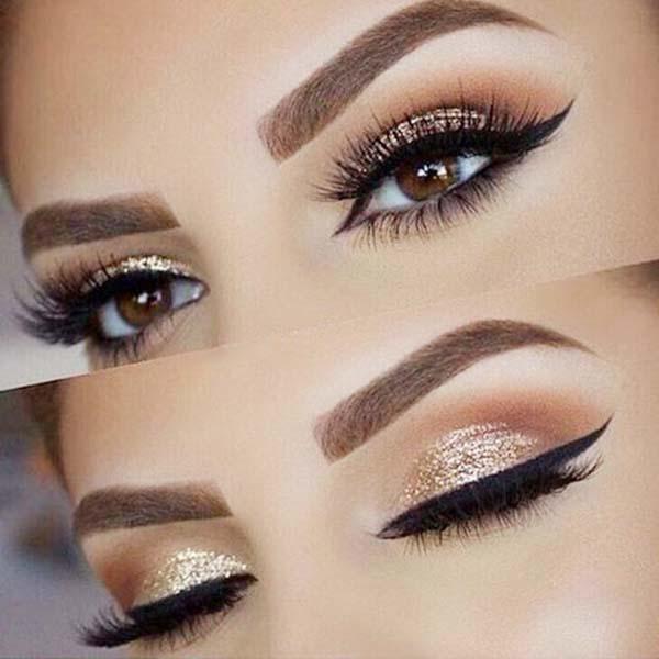 Devojka sa Novogodisnjom sminkom bež svetlucava senka ajlajner smeđe oči