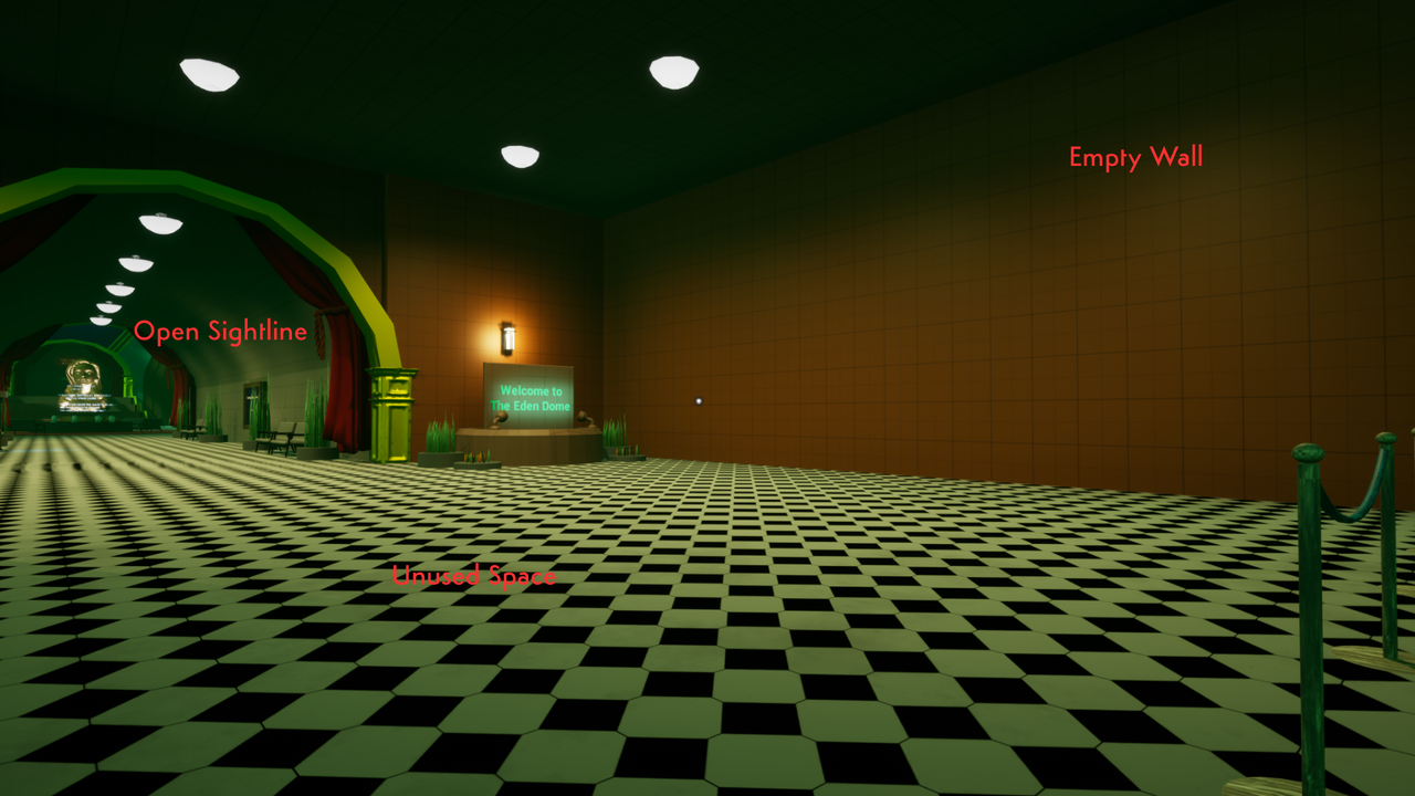 Before: original reception lobby with a large open area and limited route definition