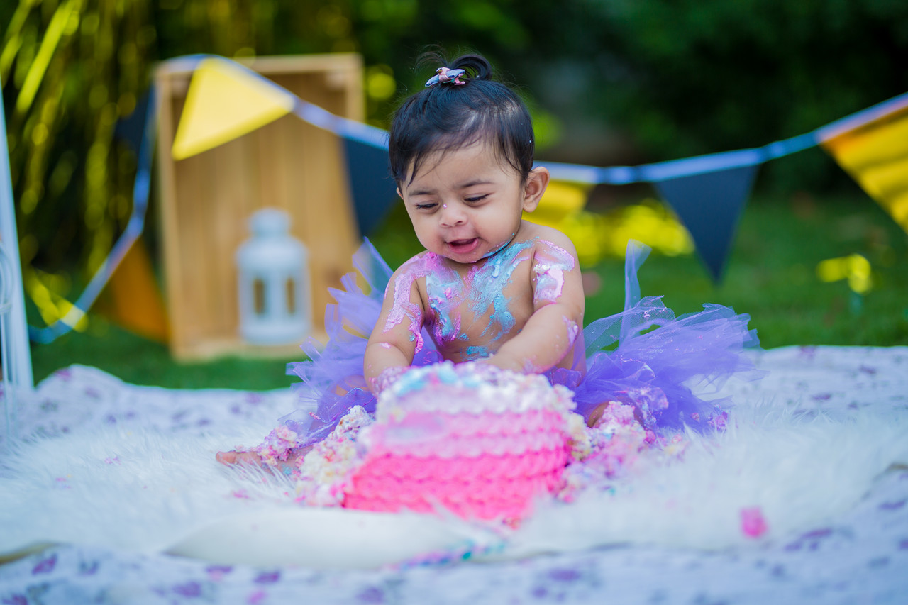 Indian first birthday cake smash photographer Birmingham — joyful moment