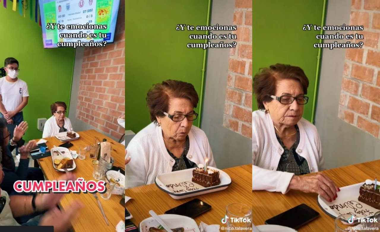 Abuela parece infeliz en su cumpleaños no sonríe y muestra disgusto