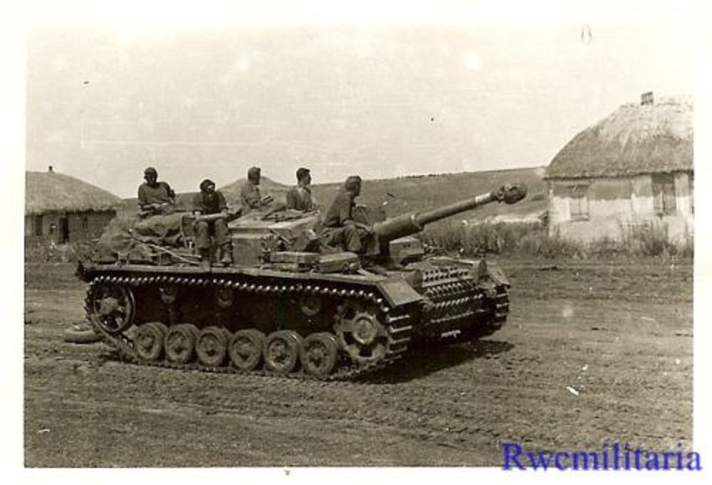 German Troops on Sturmgeschütz Panzer Tank; Kill