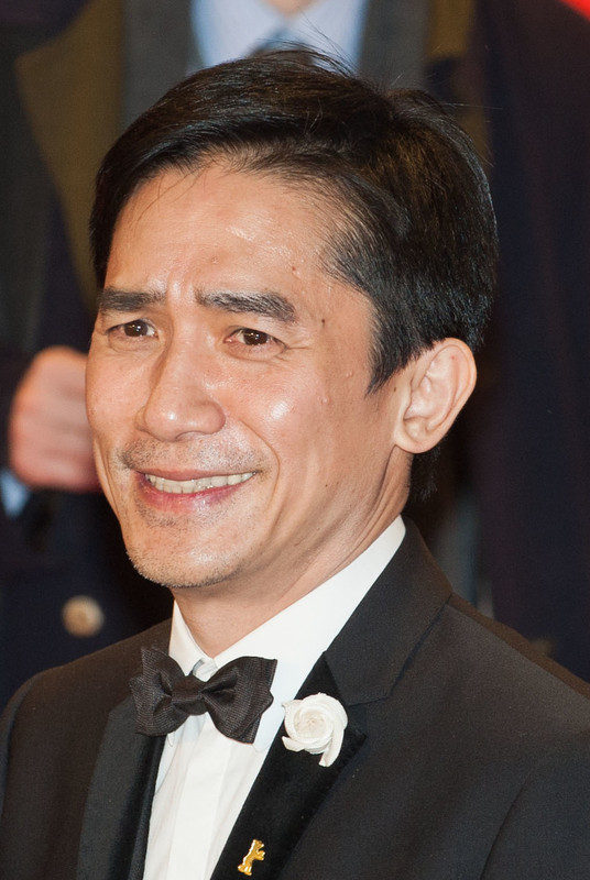 The 60-year old son of father (?) and mother(?) Tony Leung in 2022 photo. Tony Leung earned a  million dollar salary - leaving the net worth at 20 million in 2022