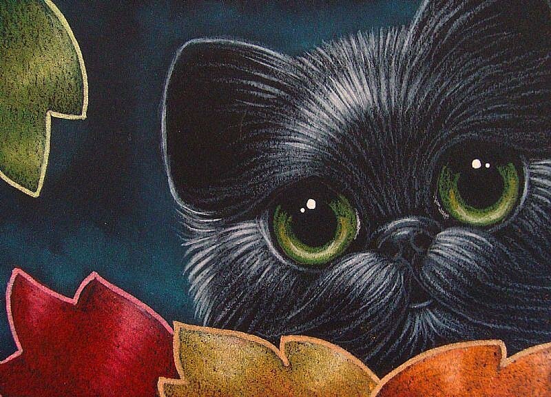 17-BLACK-KITTEN-CAT-BEHIND-THE-COLORED-LEAVESjpg