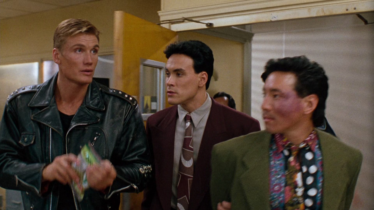 Showdown in Little Tokyo (1991) + Extras (1080p BluRay x265 HEVC 10bit EAC3 2.0 SAMPA) [QxR]