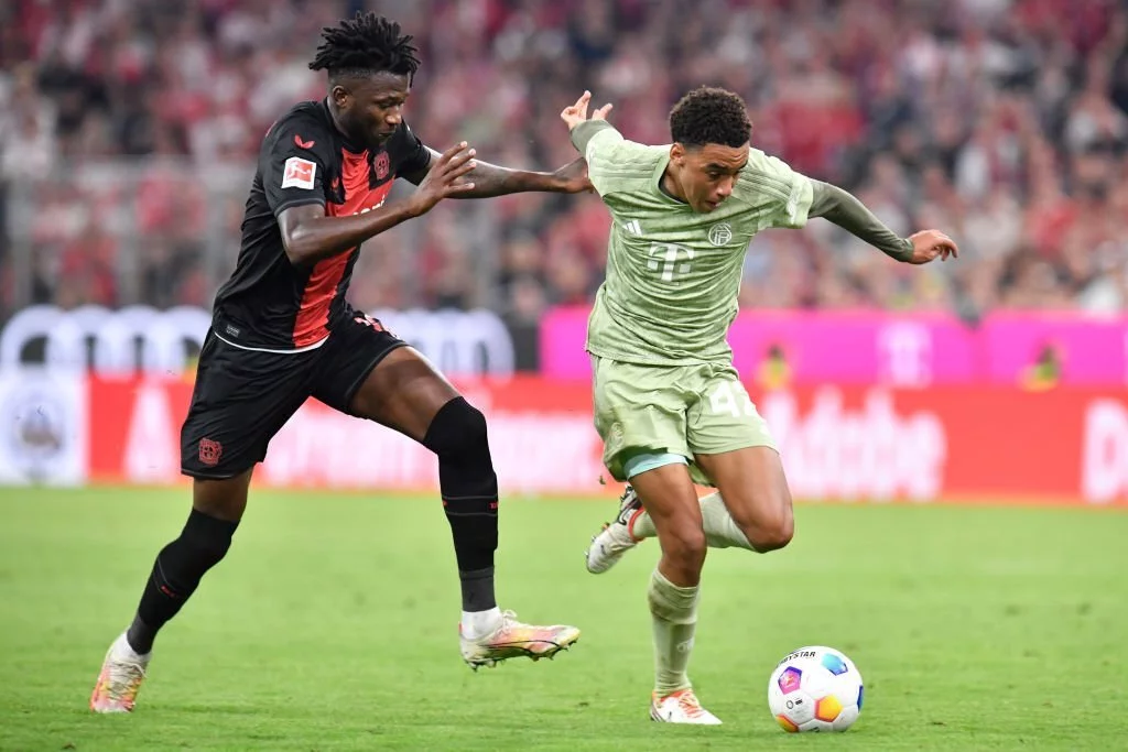 Musiala and Tapsoba playing against each other