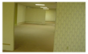 An image of Level 0 taken from the original source, a 4Chan post from 2019, that created and brought attention the Backrooms creepypasta.
