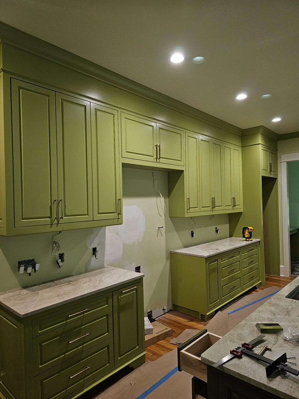 Detailed cabinet doors staged for finishing