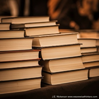 Pile of books in varying sizes and colors