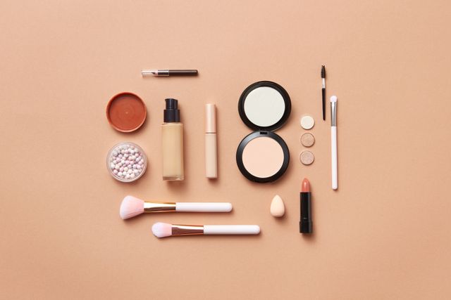 makeup products that are compatible with each other flatly lay on a surface 