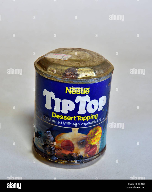 out-of-date-food-tin-with-blown-top-and-bottom-and-rust-from-storing-too-long-2J1JN6B