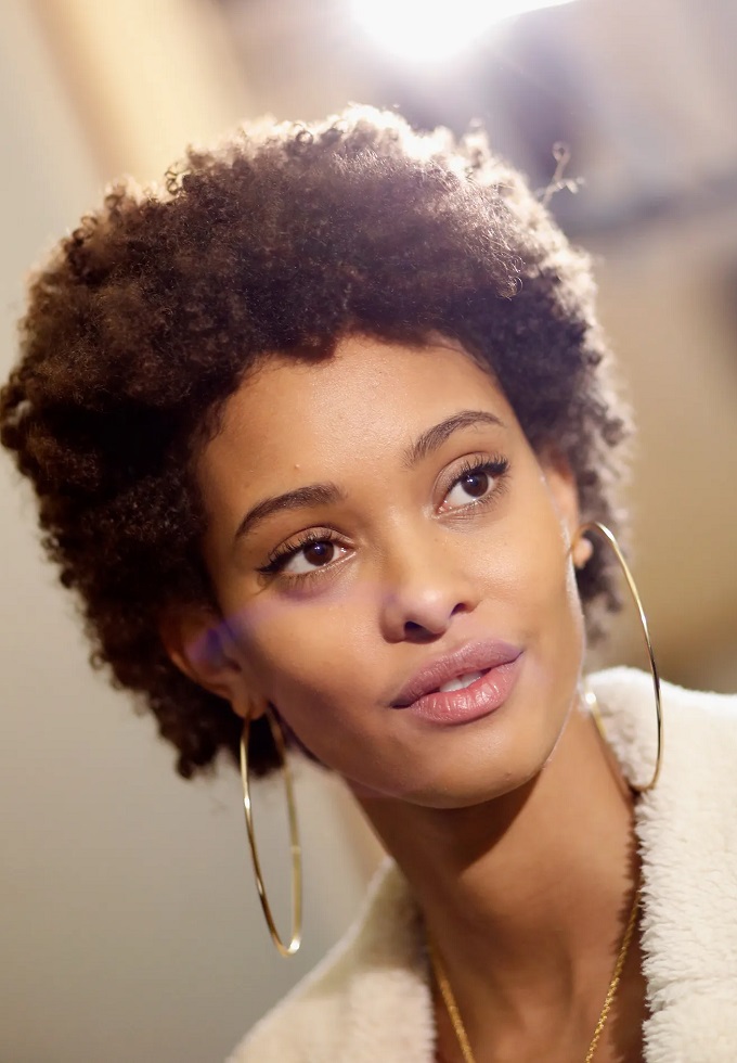Woman with a short afro natural hairstyle