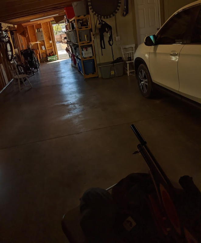 stripper test with truck backed out of garage
