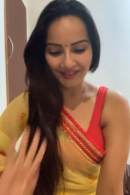 Geetanjali Mishra Sexy Cleavage and armpit though in Orange sleevless saree.mp4_snapshot_02.46.789