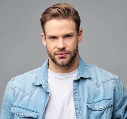 portrait-young-handsome-man-jeans-shirt-