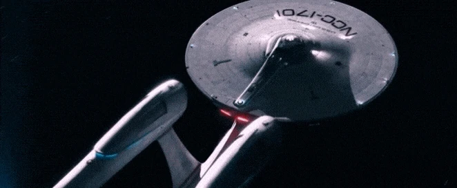 a gif of the USS Enterprise (from the Kelvin timeline) warping away