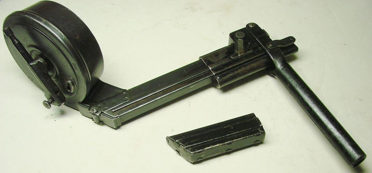 AEG TM08 with Bing magazine loader and dust cover