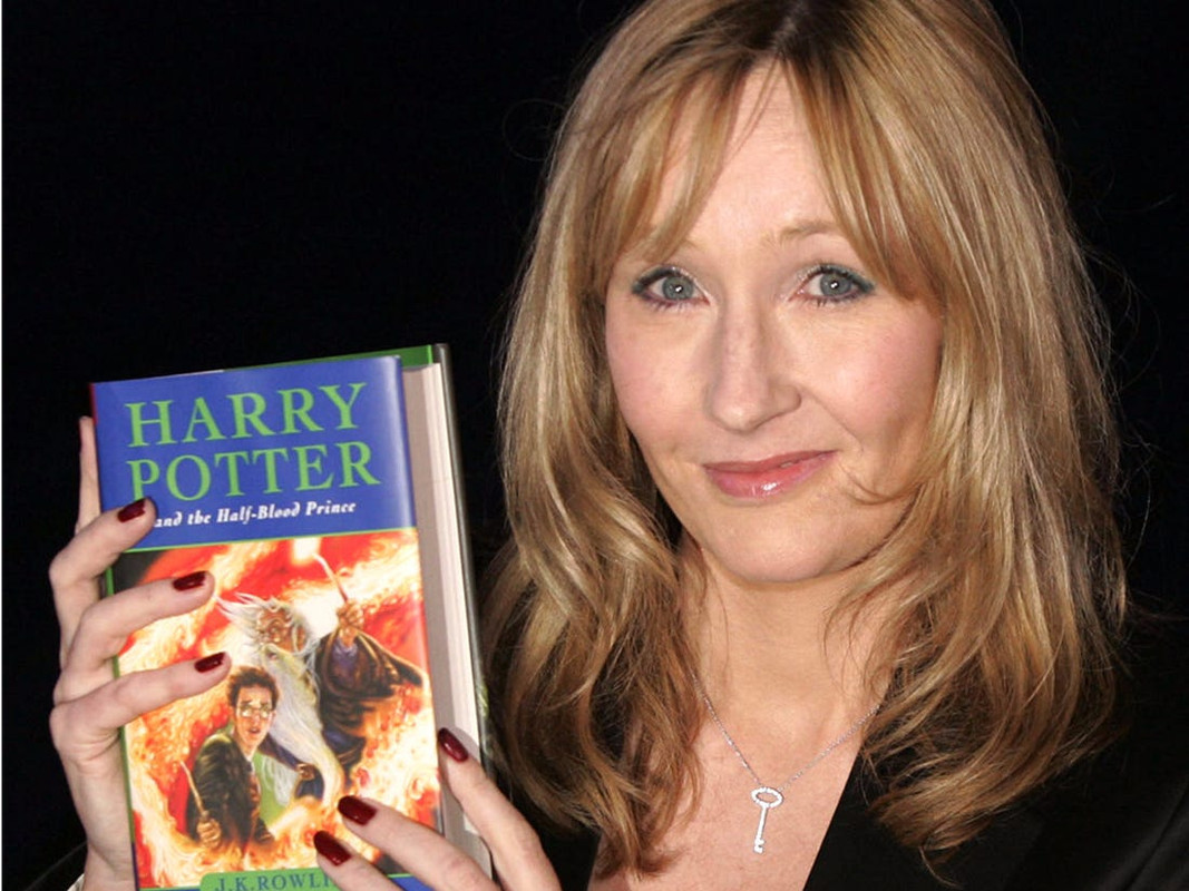 J.K. with her own book The Harry Potter