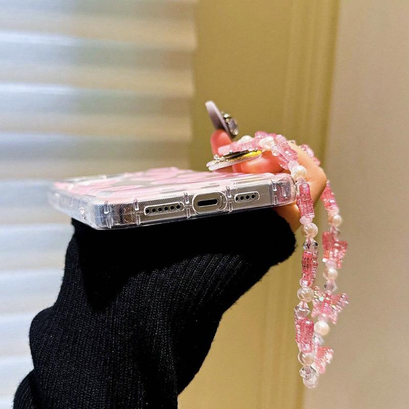 Foto de Funda transparente con diseño corazón. Incluye correa de mano.