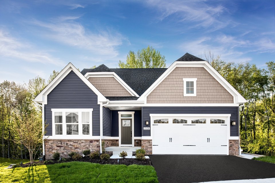 graphic of hand holding miniature house