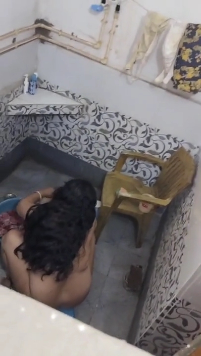 Chubby-Desi-Bhabhi-Washing-Caught-Hidden