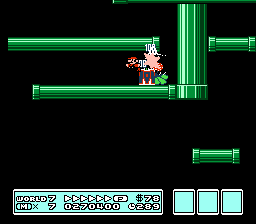 Small Mario stomps on a thrown shell to stop it while it kills a Lava Lotus at the same time in World 7's only level.