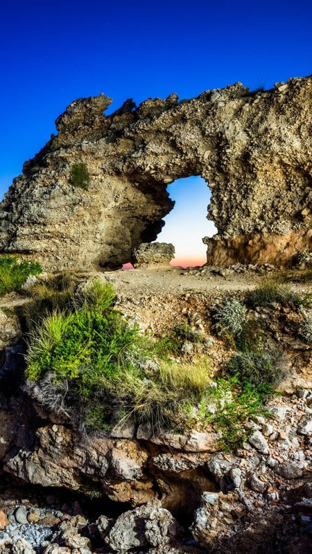 Natural rocky arch formation at Dhërmi beach, Vlorë County, Alba