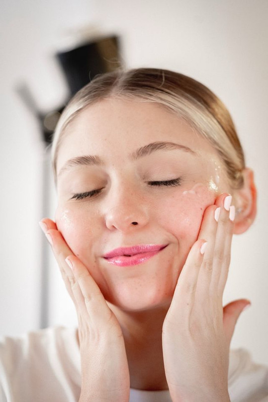 a woman with healthy, glowing skin 