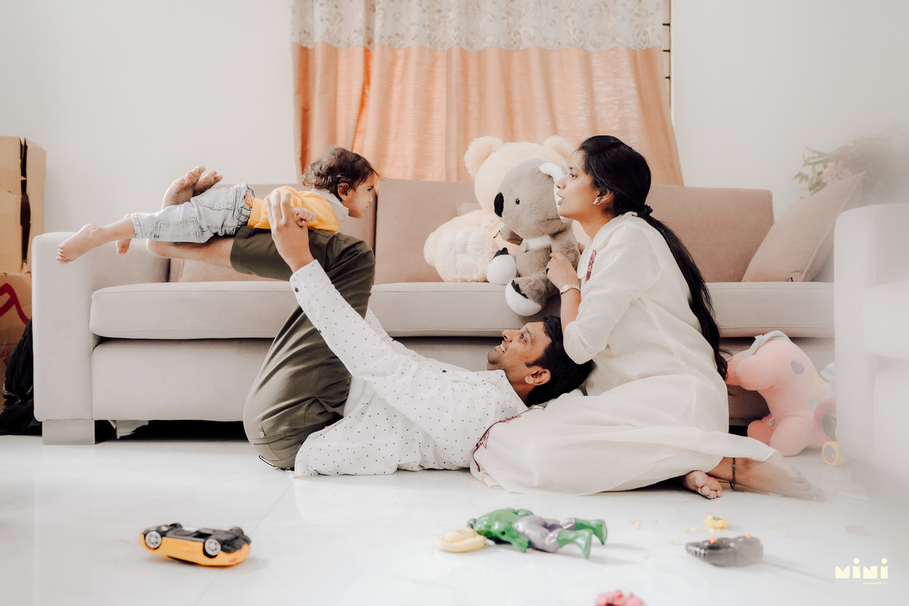 Telugu family photographer Coventry — natural light family portrait at home