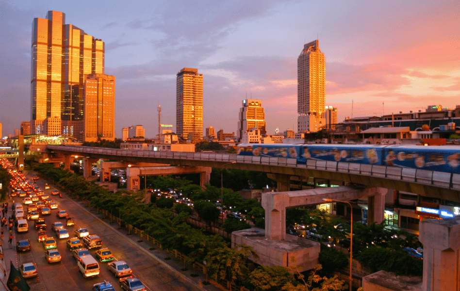 Bangkok skyline and BTS train in the evening
