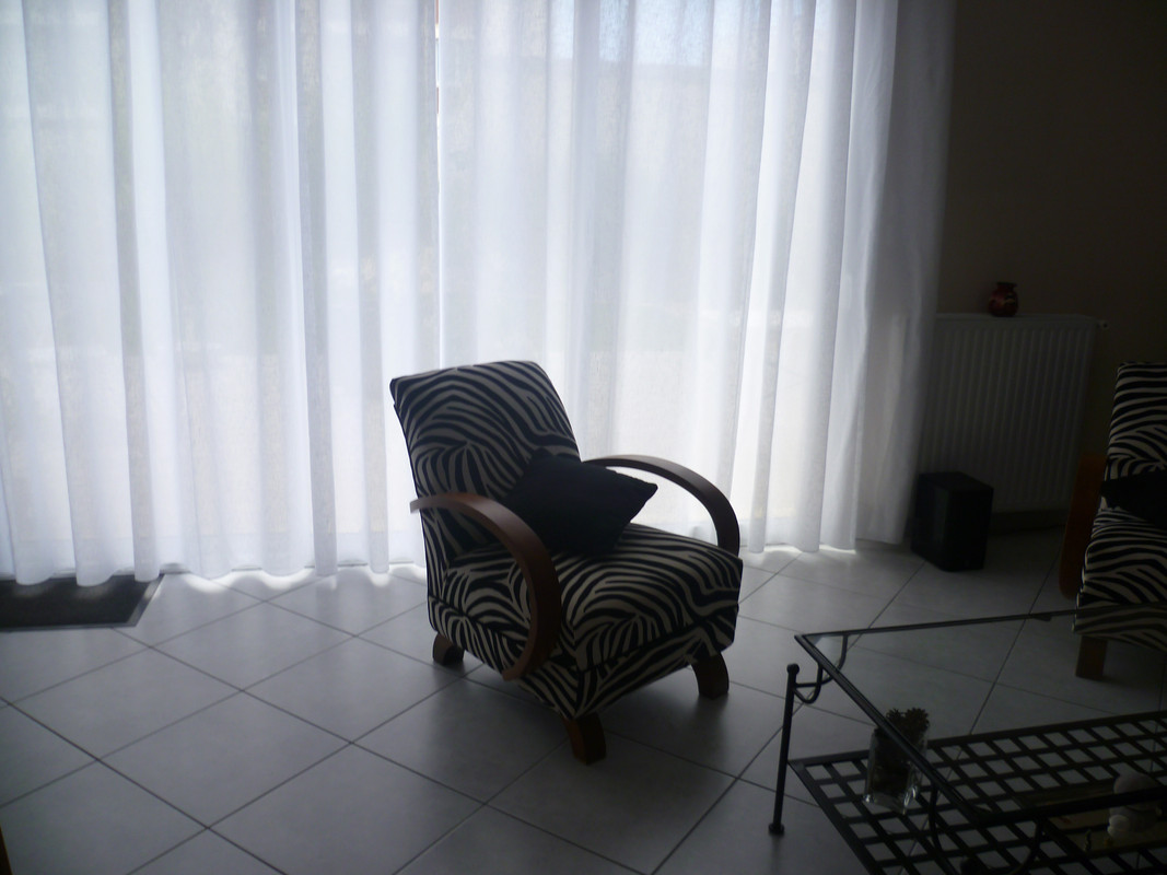Siège rénové de tapissier décorateur