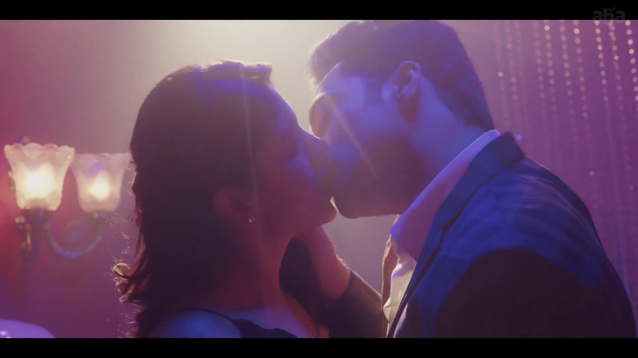 Chandini Chowdary sexy liplock scene photo showing a bold romantic moment on screen with intense chemistry.