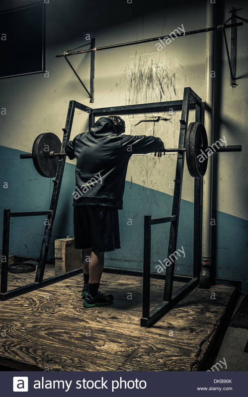 [Image: weightlifter-in-dark-gym-DKB90-K.jpg]