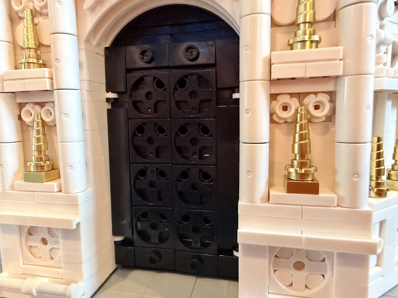 The solid brick-built front doors.