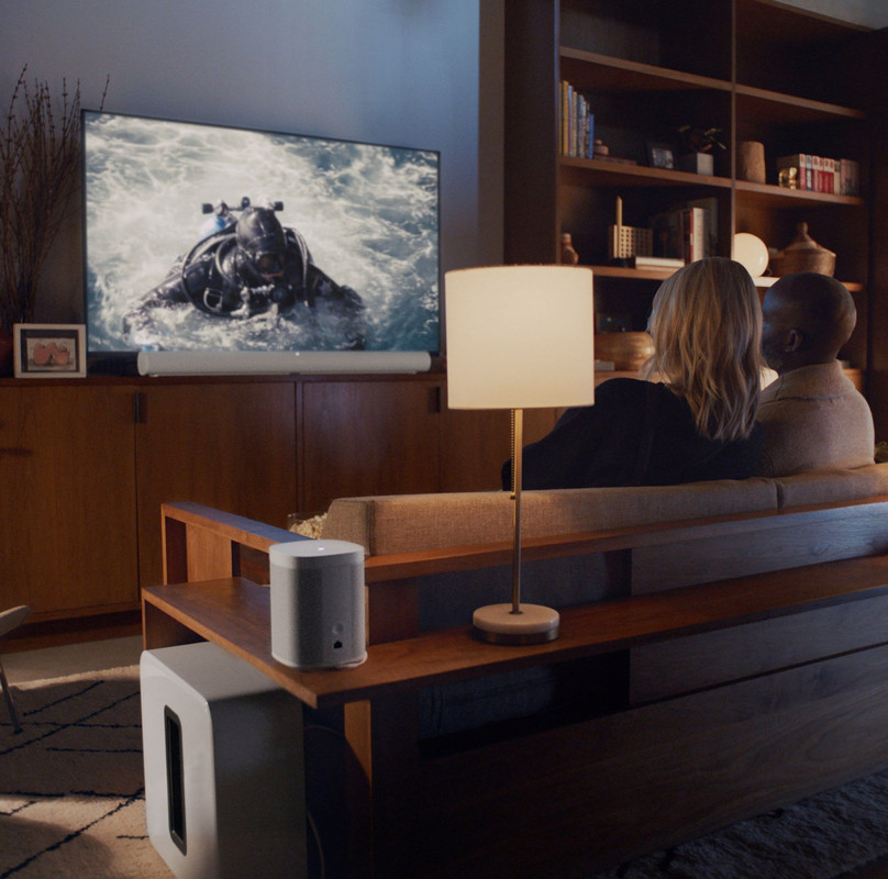Visualización del sonido 3D de la Sonos Arc llenando una habitación.